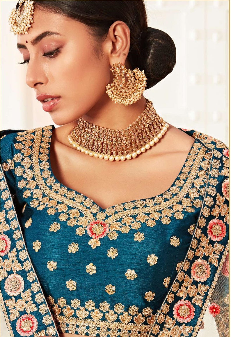 

Sabyasachi designer blue lehenga choli with heavy sequence embroidery work