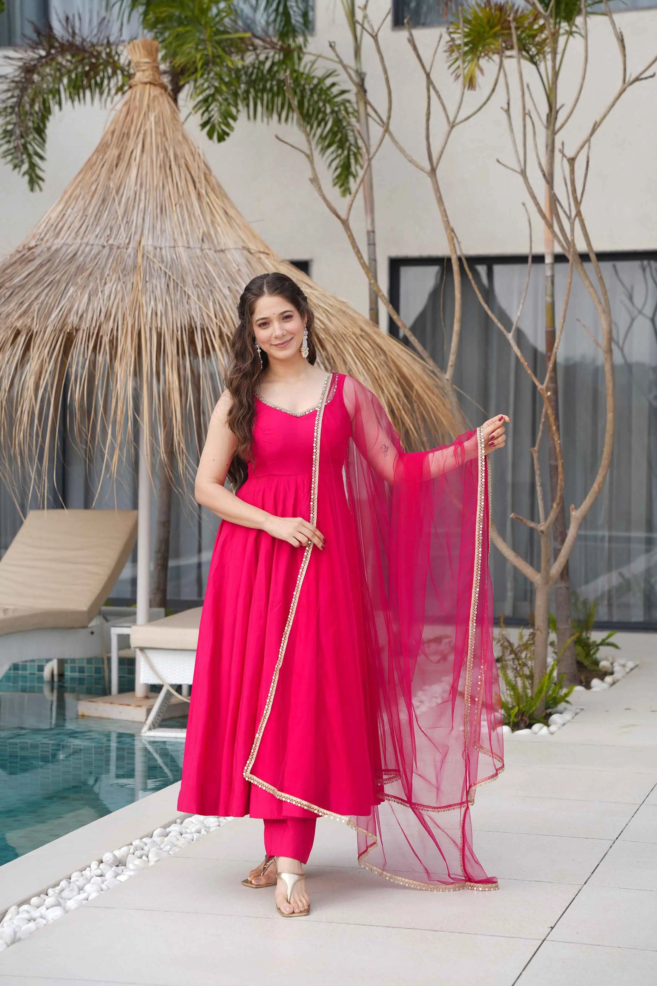 Rani Pink Roman Silk Plain Gown With Mirror Work And Net Dupatta - qivii
