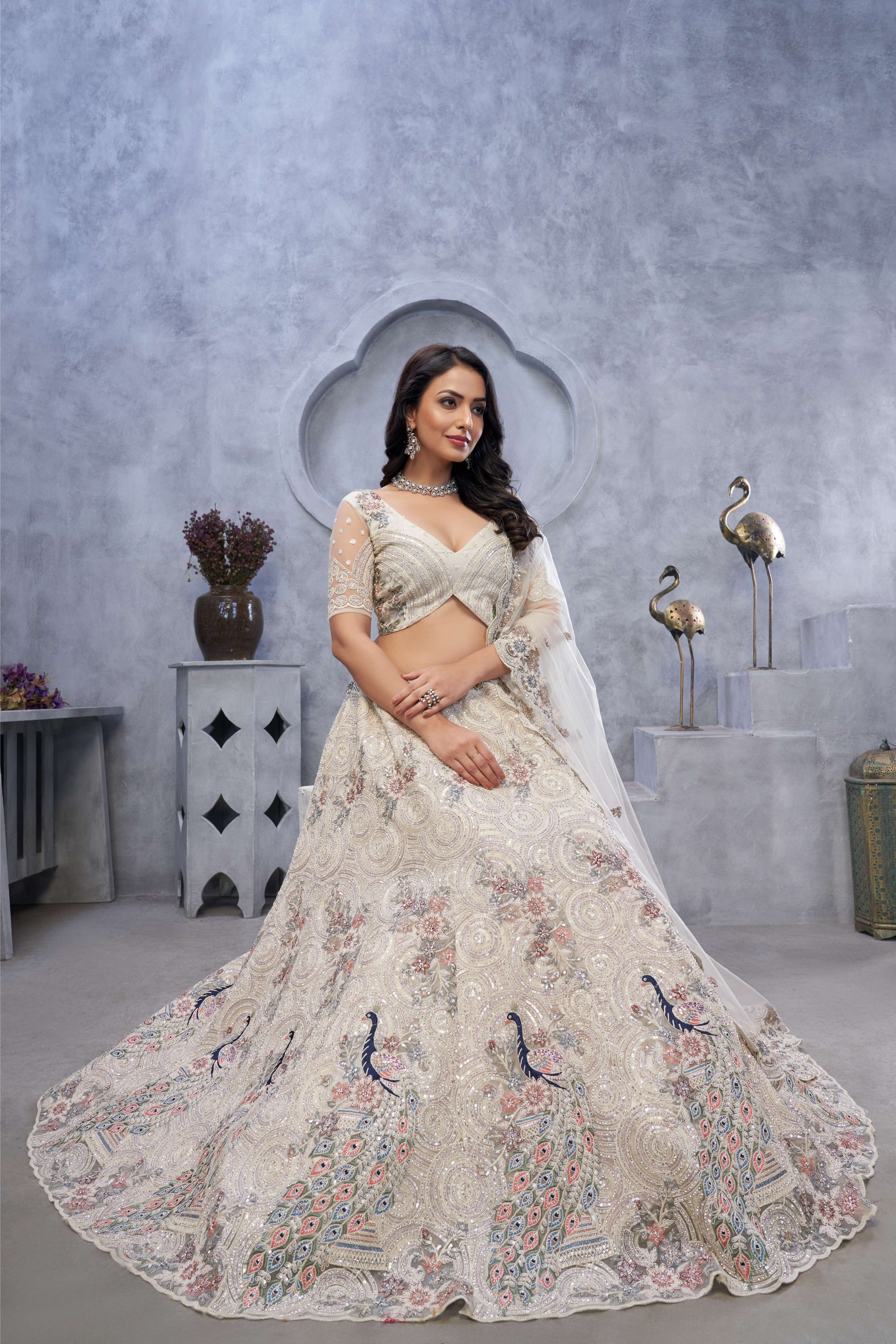 Ivory Sangeet Lehenga Choli with Bel Butti Design - qivii