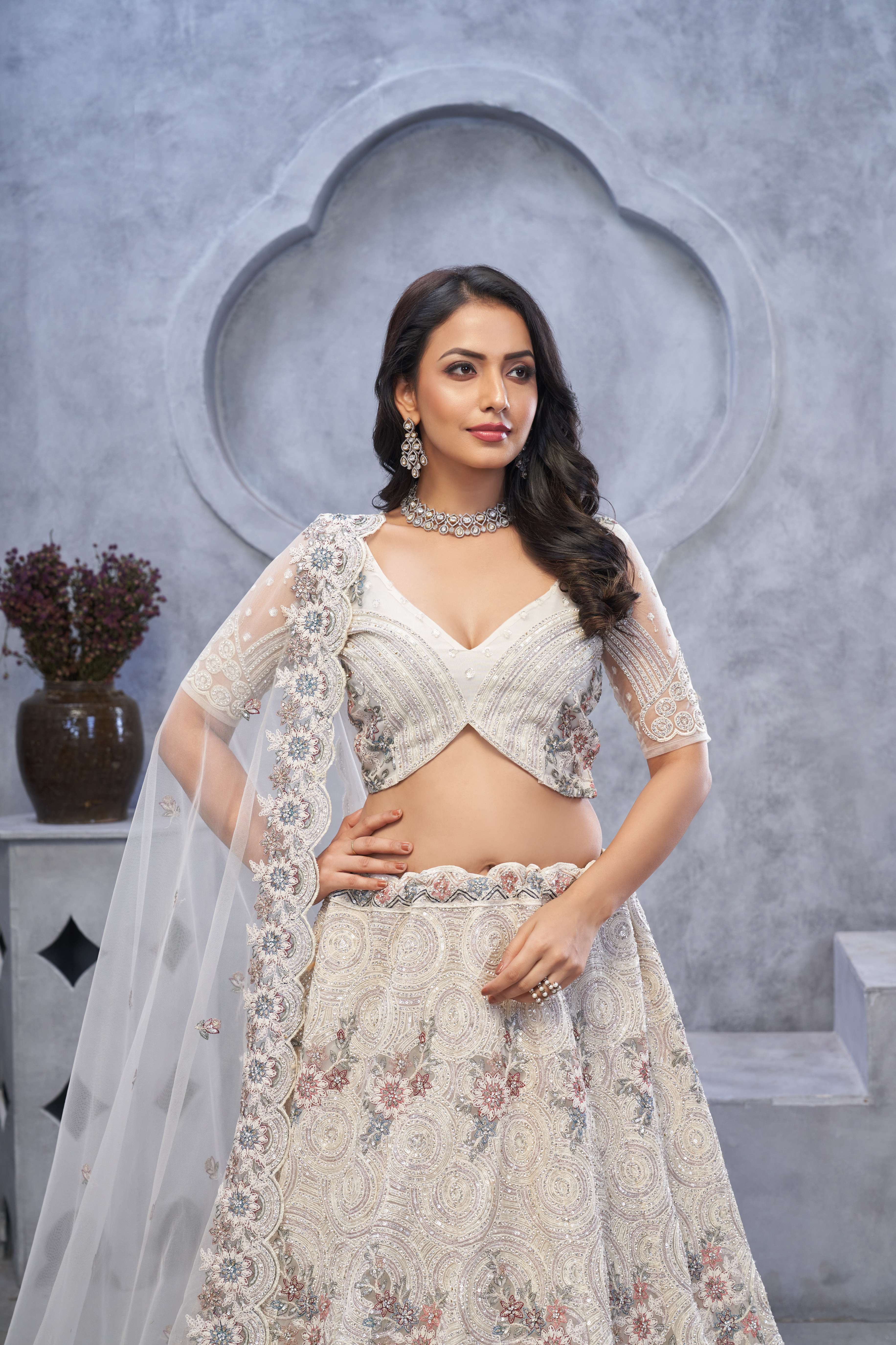 Ivory Sangeet Lehenga Choli with Bel Butti Design - qivii