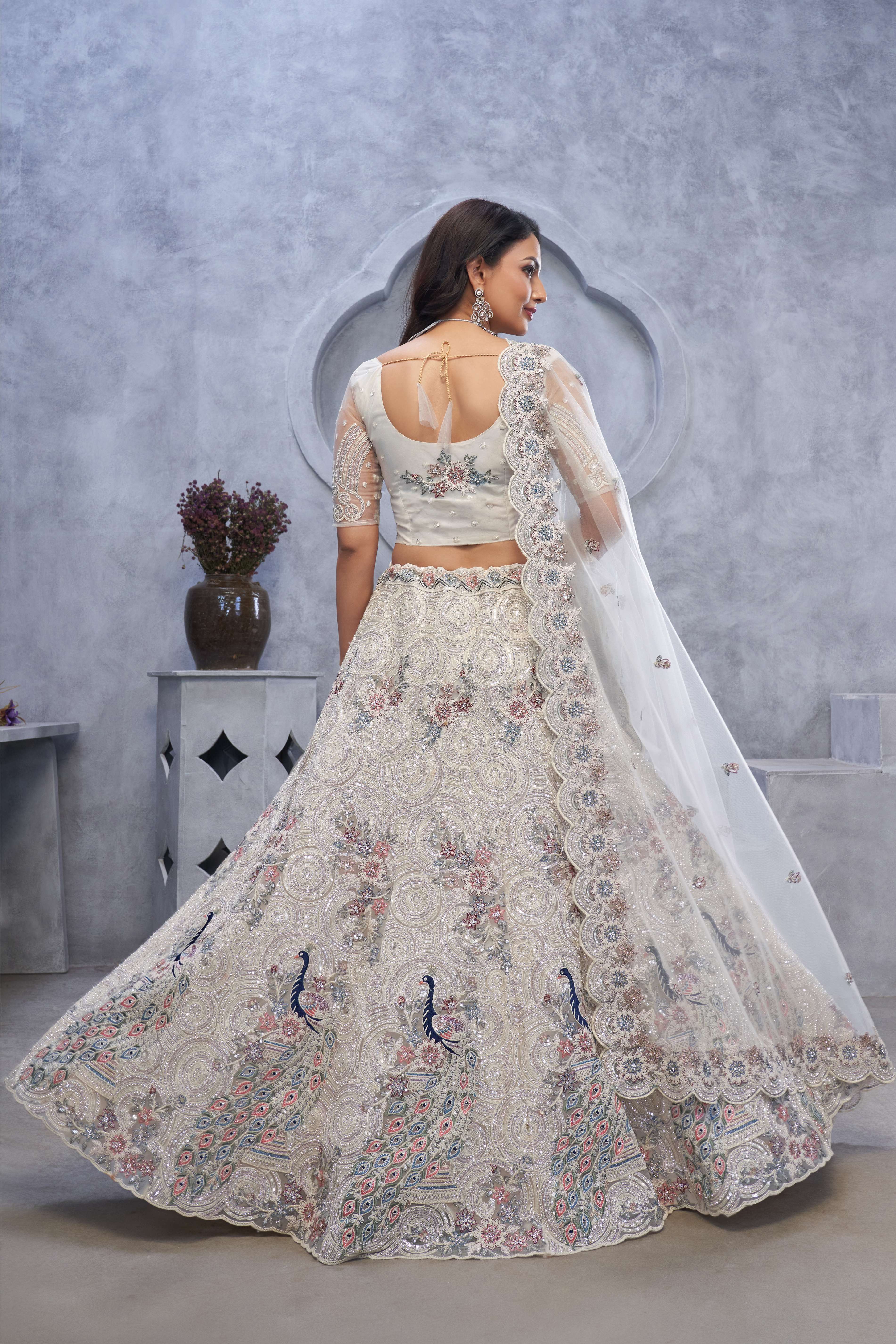 Ivory Sangeet Lehenga Choli with Bel Butti Design - qivii
