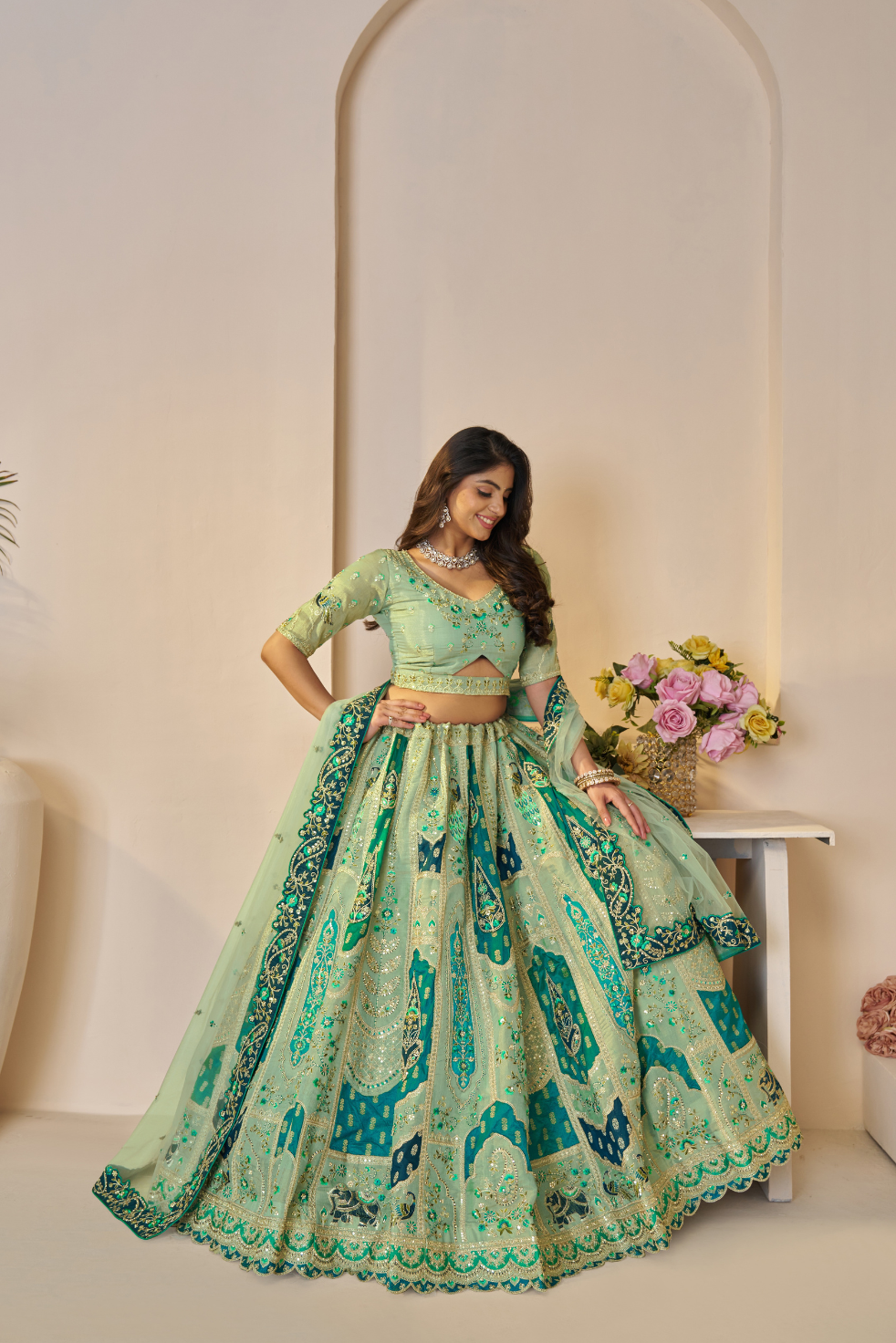 Rajsi Haathi Collection: Green Peacock-Embroidered Bridal Lehenga - qivii