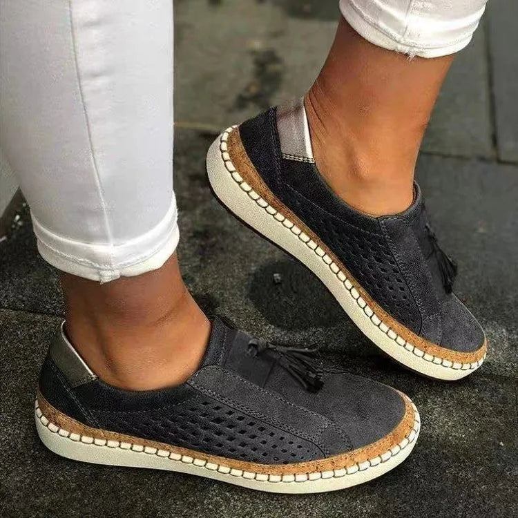 Black Kilmer women's orthopedic comfort shoes by Qivii, stylish slip-ons designed for all-day support and comfort.