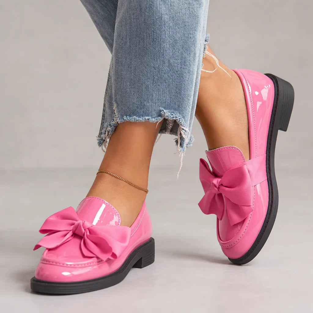 Pink women's Lawrence Bow Loafers by Hudson Ridge, stylish slip-on footwear with bow detail, perfect for casual or office wear.