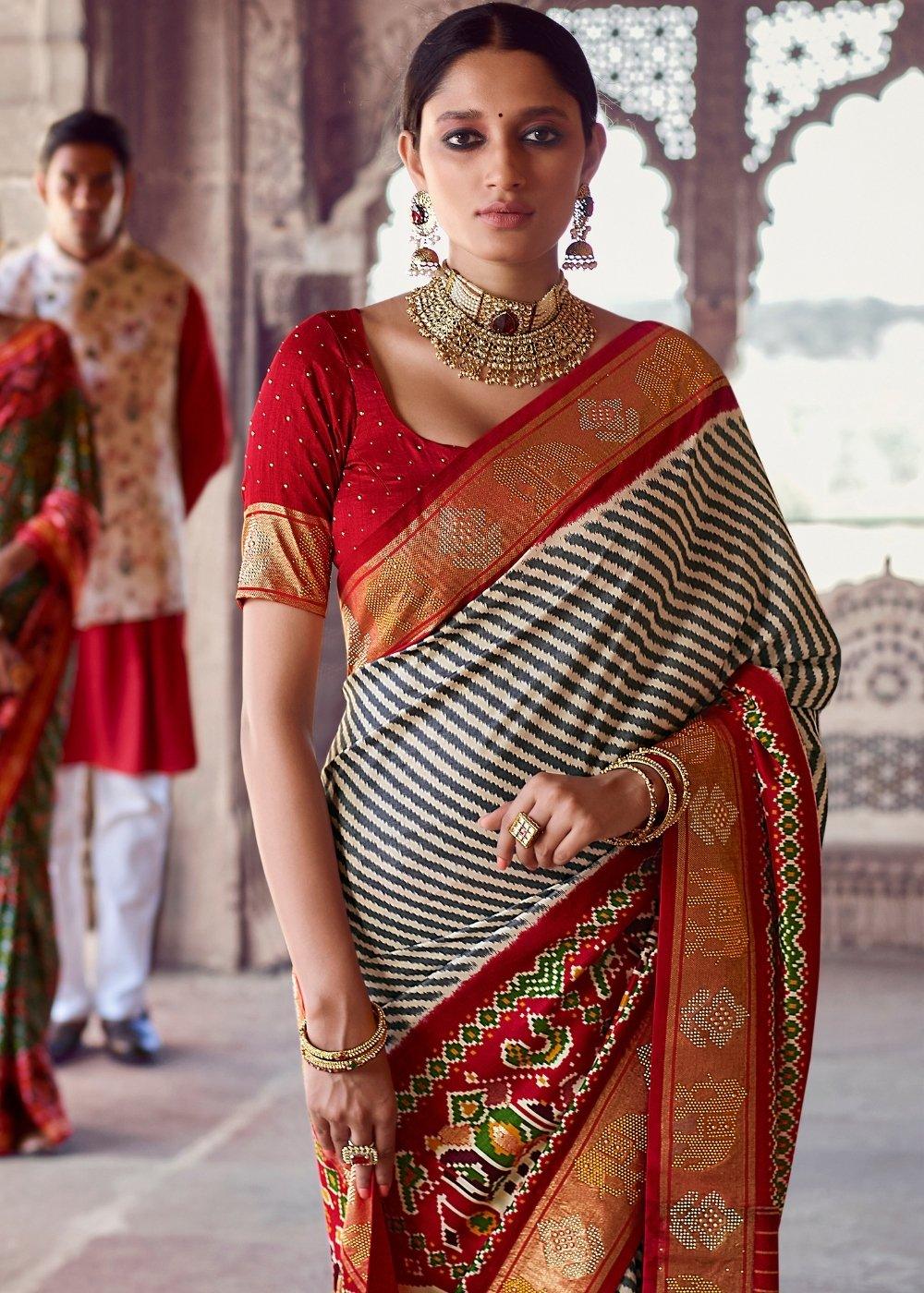 Linen White & Red Patola Silk Saree with Zari Border Pallu & Stone work(Pre-Order) : Top Pick | Stitched Blouse - qivii