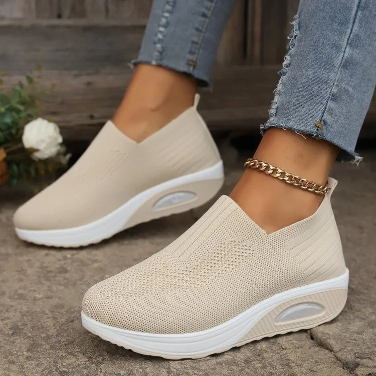 Beige women's cushioned orthopedic sneakers by Hudson Ridge, featuring supportive design and comfortable fit for everyday wear.