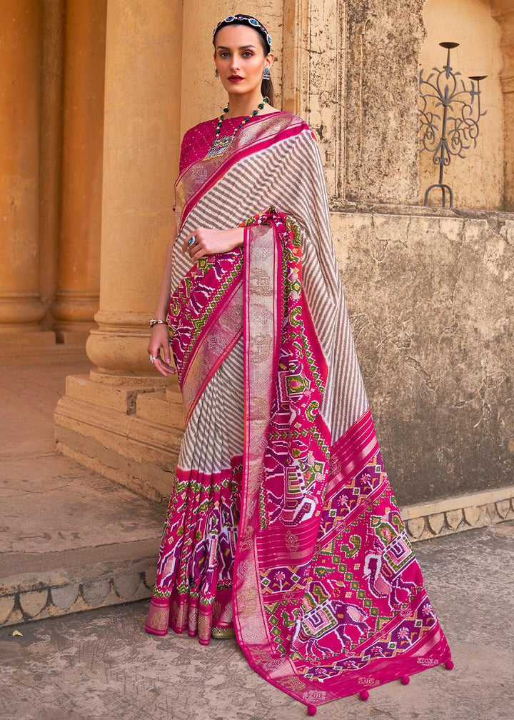 Magenta Pink Designer Patola Silk Saree with Zari Border & Stone work | Stitched Blouse - qivii