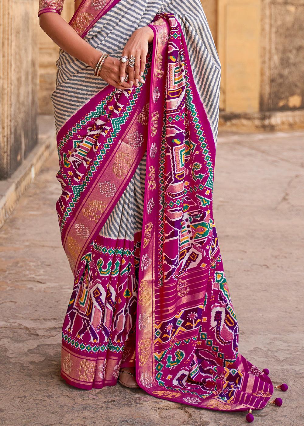 Magenta Purple Designer Patola Silk Saree with Zari Border & Stone work | Stitched Blouse - qivii