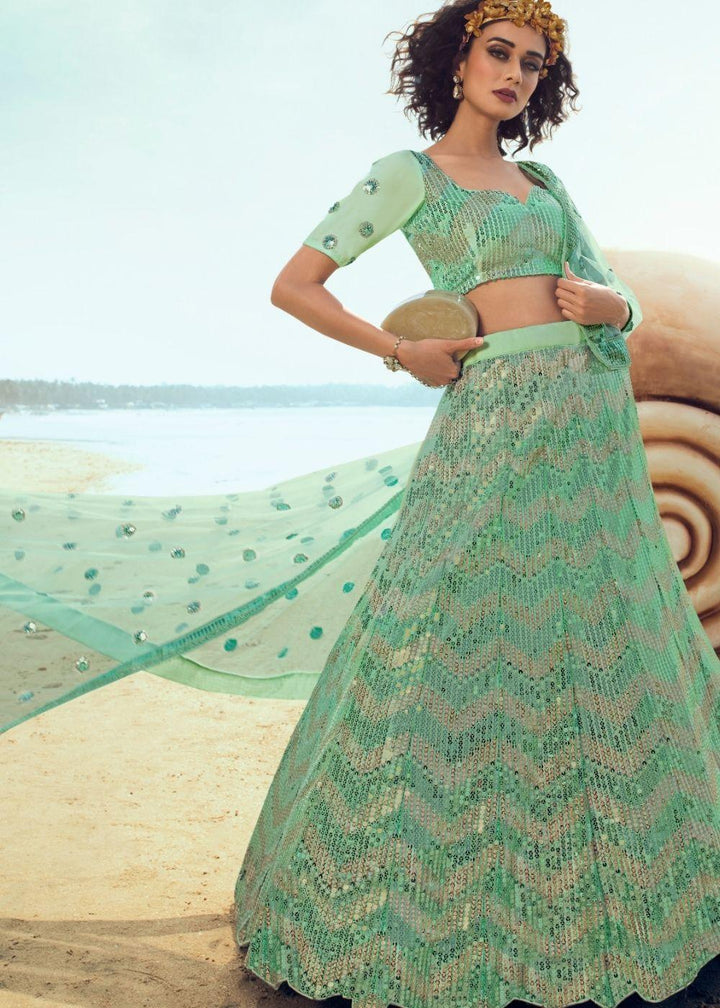 Mint Green Soft Net Designer Lehenga Choli with overall Sequins work - qivii