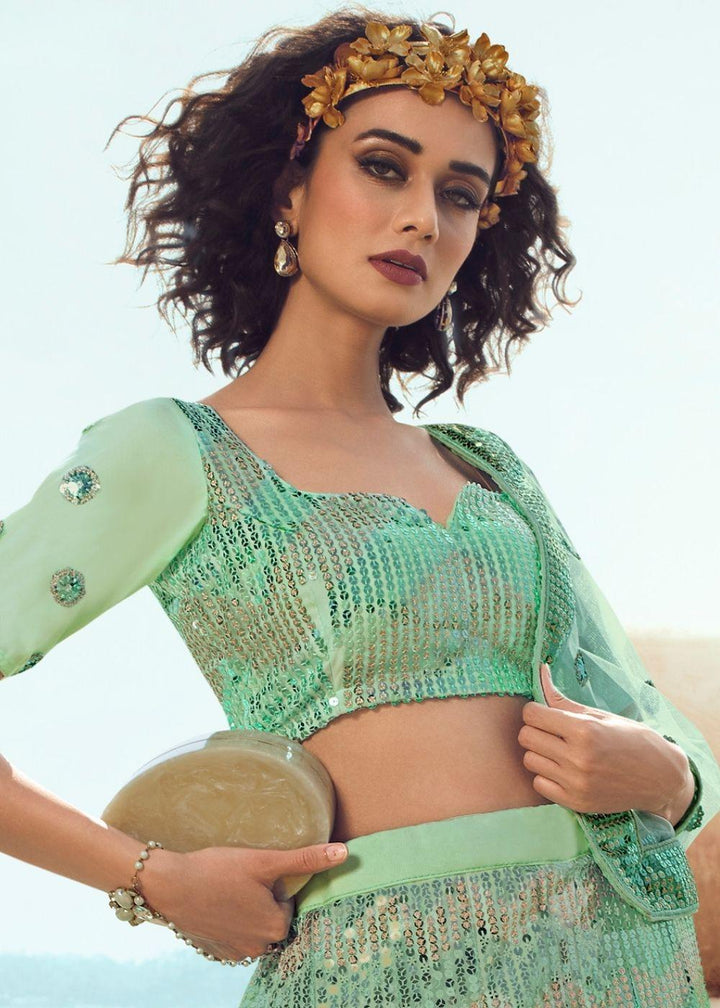 Mint Green Soft Net Designer Lehenga Choli with overall Sequins work - qivii