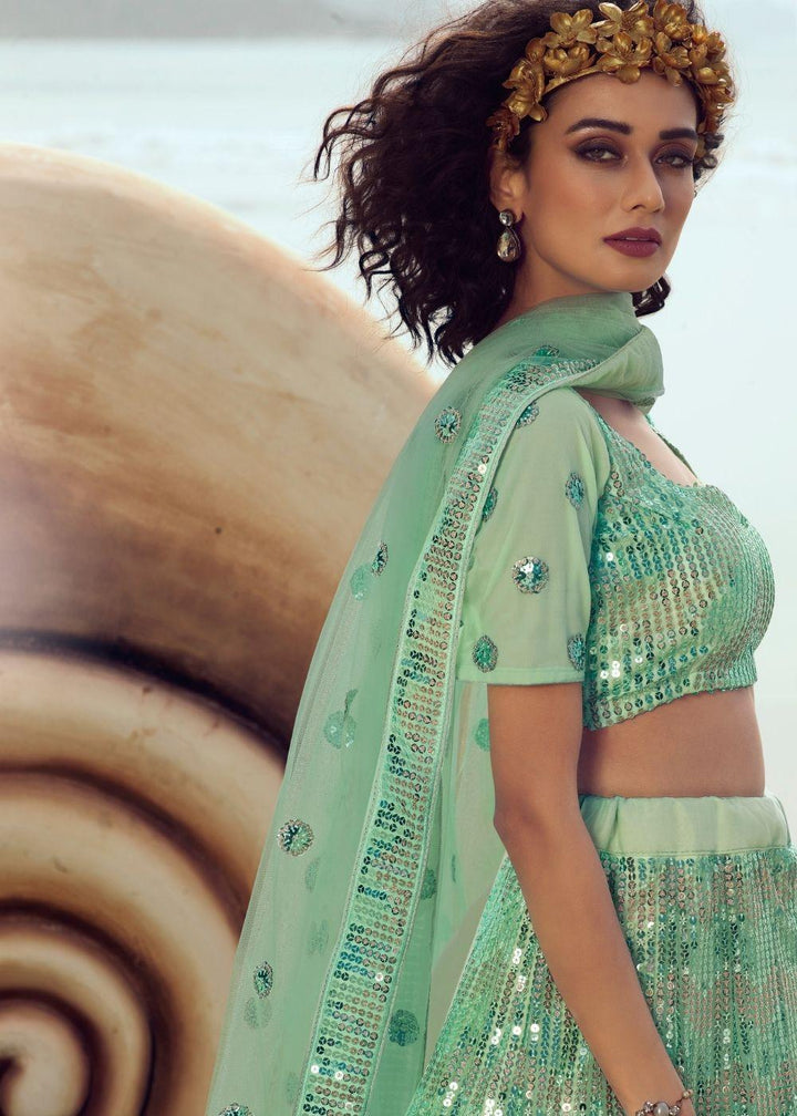 Mint Green Soft Net Designer Lehenga Choli with overall Sequins work - qivii