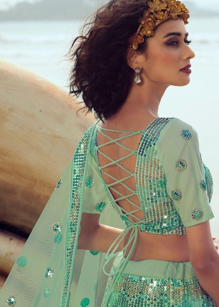 Mint Green Soft Net Designer Lehenga Choli with overall Sequins work - qivii