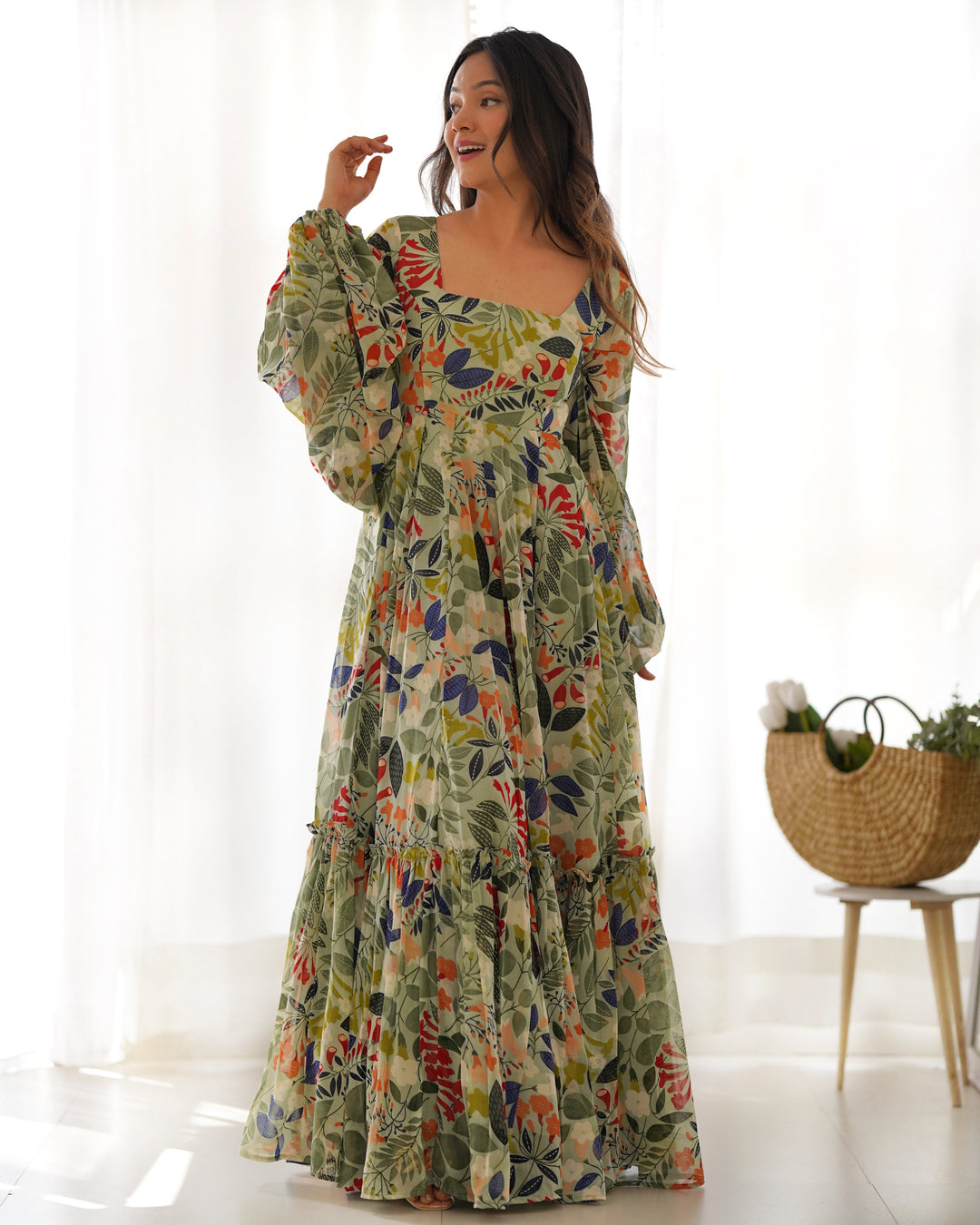 Multi color printed georgette base floral gown by Qivii