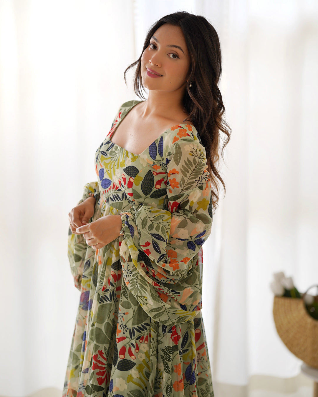 Multi color printed georgette base floral gown by Qivii