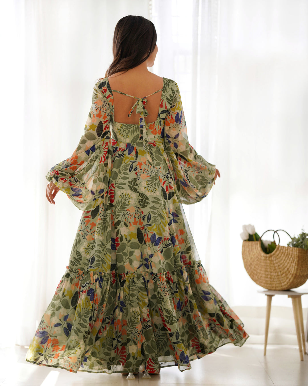 Multi color printed georgette base floral gown by Qivii