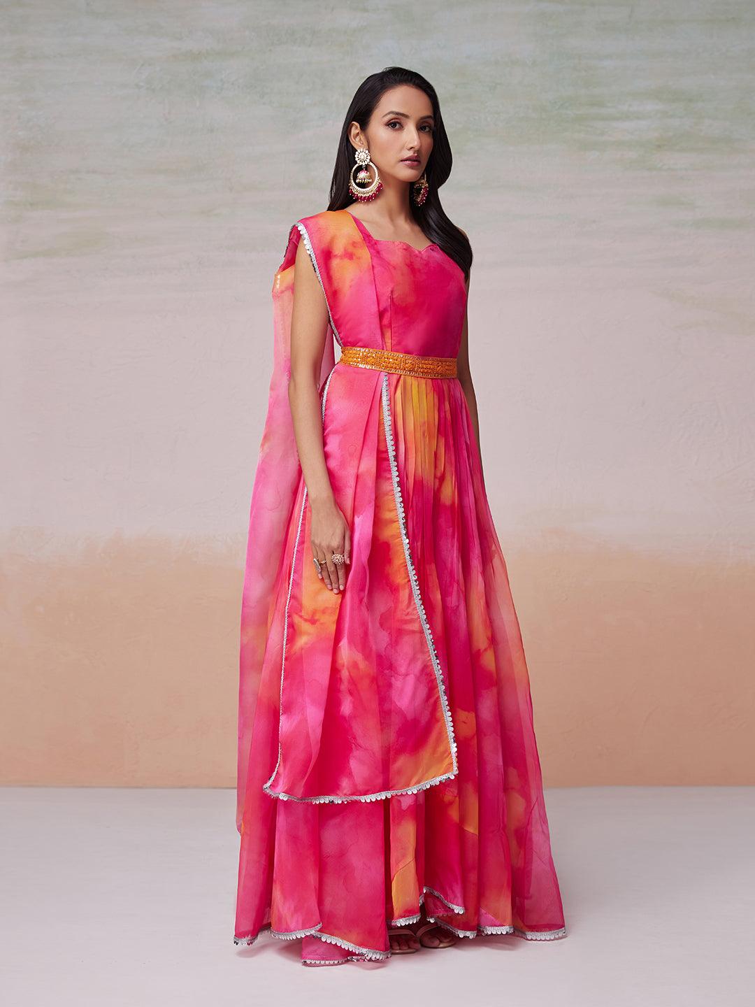 Beautiful and eye-catching multi flux printed gown with a matching dupatta and belt by Qivii