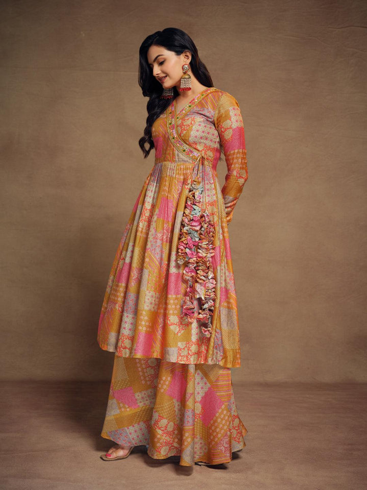 Stylish mustard color muslin palazzo suit set with intricate details by Qivii