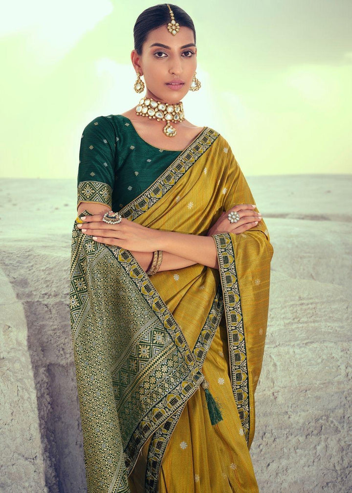 Mustard Yellow Woven Banarasi Silk Saree with Embroidered Border & Swarovski work | Stitched Blouse - qivii