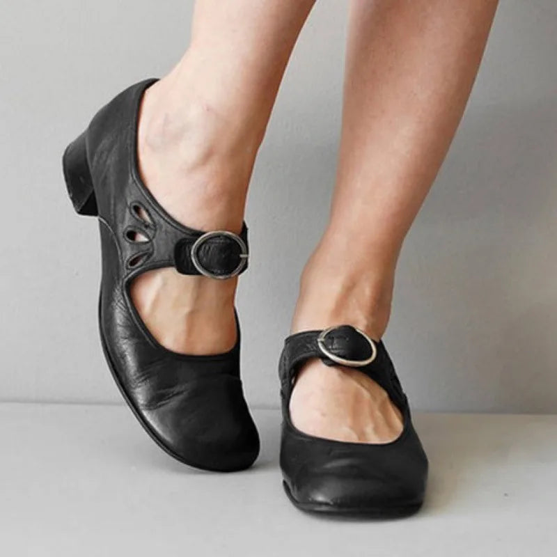 Black women's Mary Jane shoes by Hudson Ridge, Nettie style, featuring classic slip-on design and comfortable footwear for women.