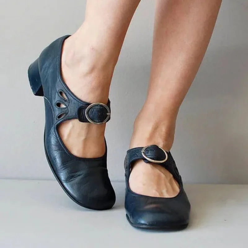 Blue women's Mary Jane shoes by Hudson Ridge, featuring a classic slip-on design with rounded toe and comfortable fit.