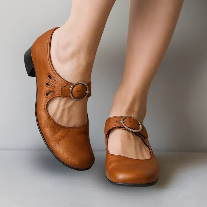 Brown women's Mary Jane shoes by Hudson Ridge, featuring a classic design with a rounded toe and comfortable fit.