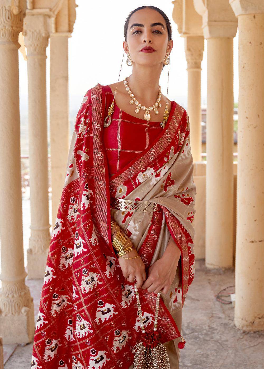 Oat Brown Printed Patola Silk Saree with Zari Border & Tassels on Pallu | Stitched Blouse - qivii