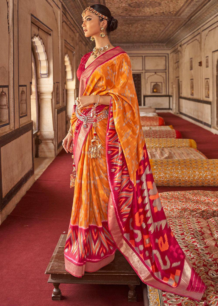 Orange & Pink Printed Patola Dola Silk Saree with Zari Border | Stitched Blouse - qivii