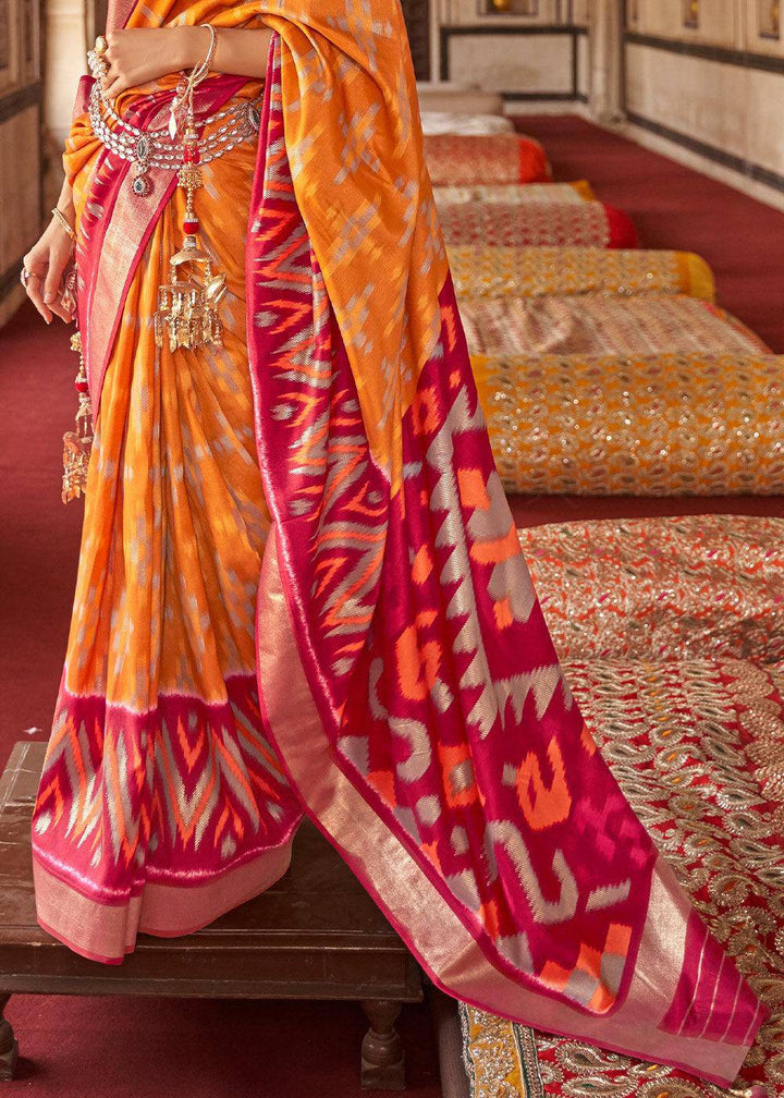 Orange & Pink Printed Patola Dola Silk Saree with Zari Border | Stitched Blouse - qivii