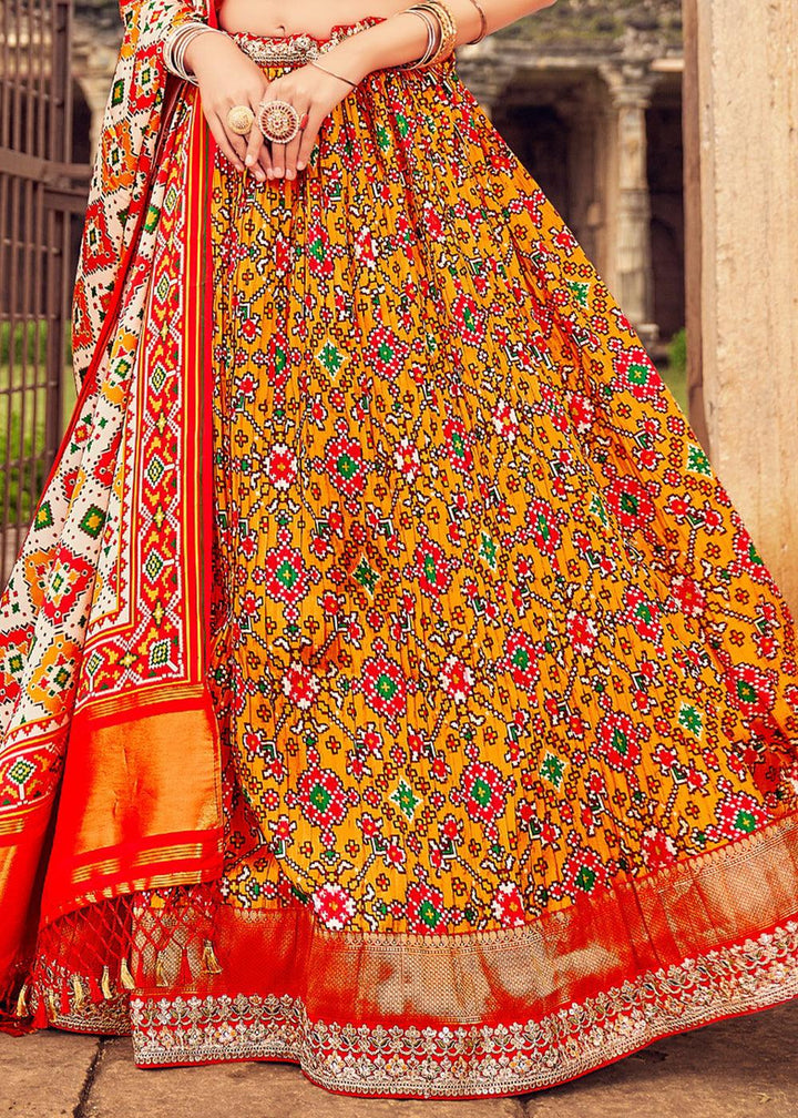 Orange & Red Patola Printed Banarasi Silk Lehenga Choli with Embroidery Work - qivii