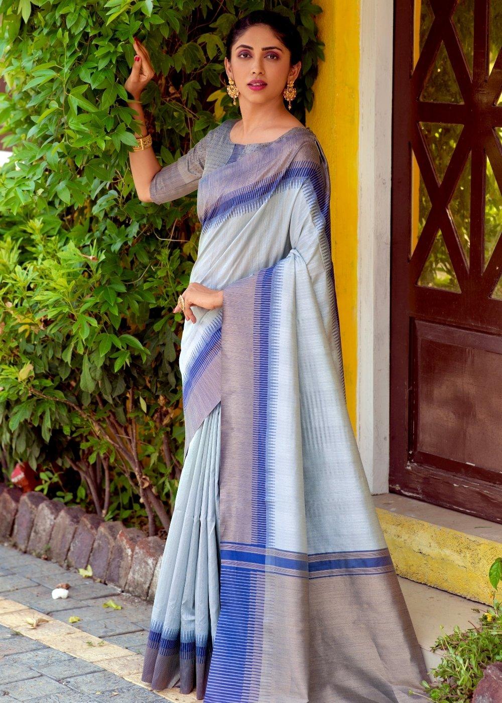 Pastel Blue Zari Weaving Silk Saree with Tassels on Pallu | Stitched Blouse - qivii