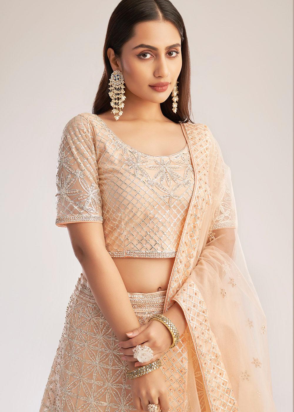 Pastel Salmon Pink Net Lehenga Choli with Gota and Zarkan work - qivii