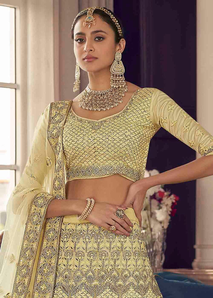 Pastel Yellow Crepe Lehenga Choli with Zarkan,Thread & Zari work - qivii