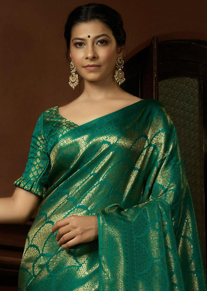 Peacock Green & Golden Blend Woven Kanjivaram Silk Saree | Stitched Blouse - qivii