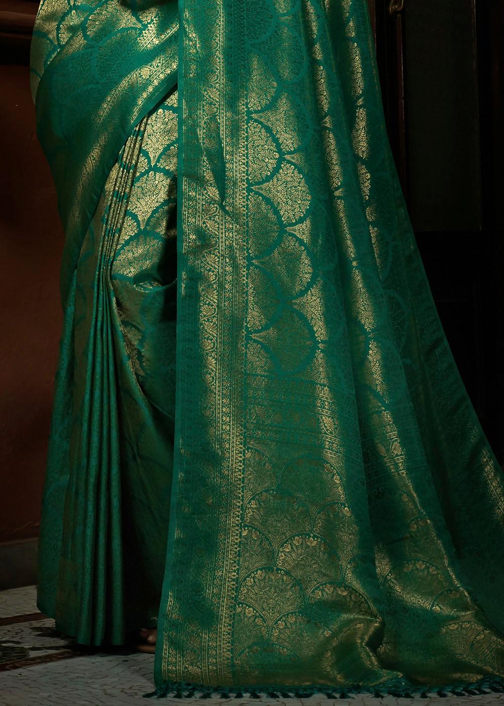 Peacock Green & Golden Blend Woven Kanjivaram Silk Saree | Stitched Blouse - qivii