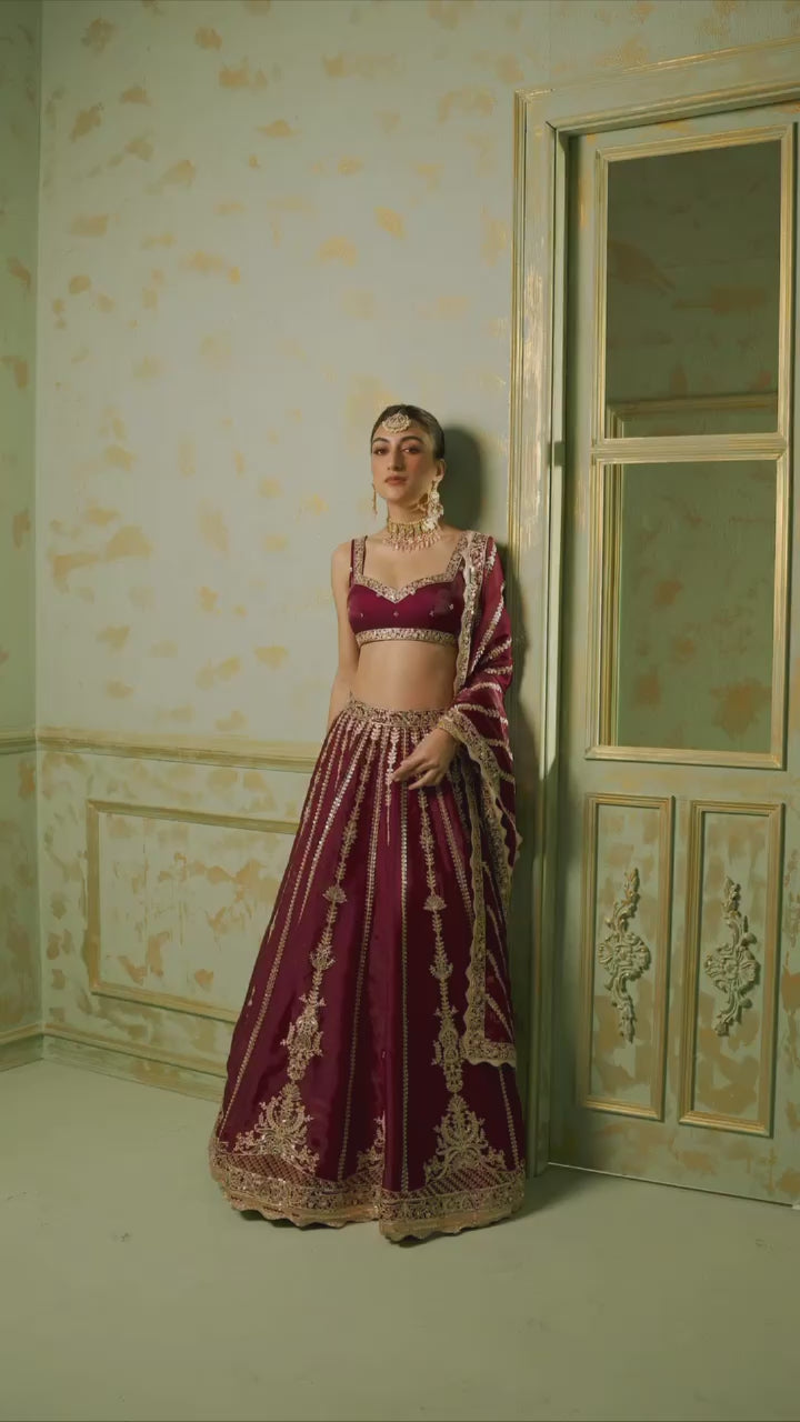 Wine Kasturi silk lehenga with sequins , dori & zari work