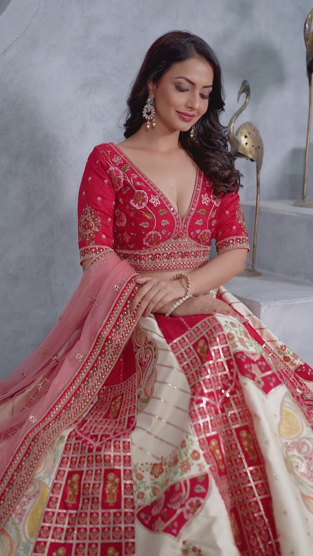 The Red and White Masterpiece Lehenga with Paisley Motifs and Sheer Pink Dupatta