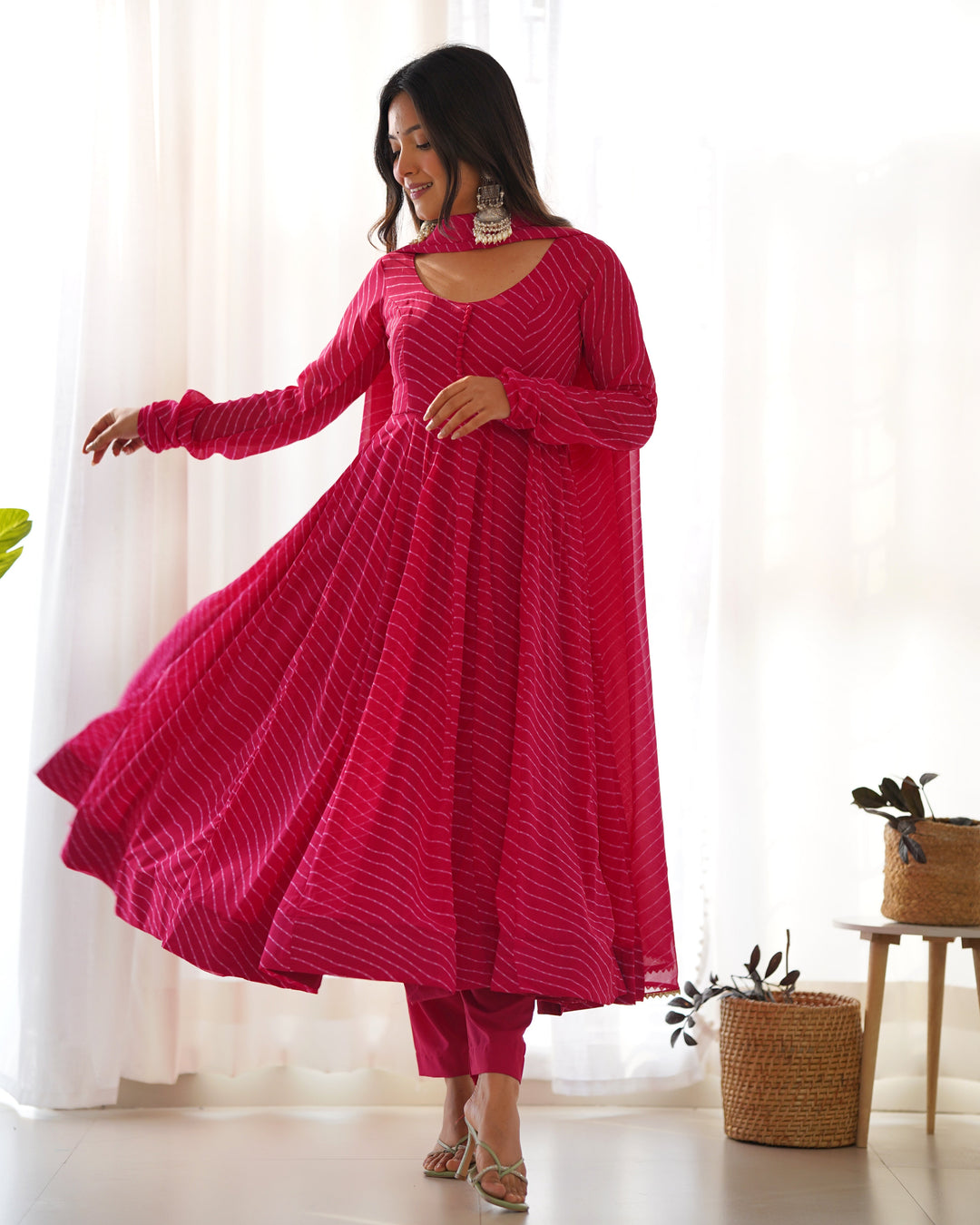 Qivii's exquisite Rani pink georgette anarkali suit with laheriya print