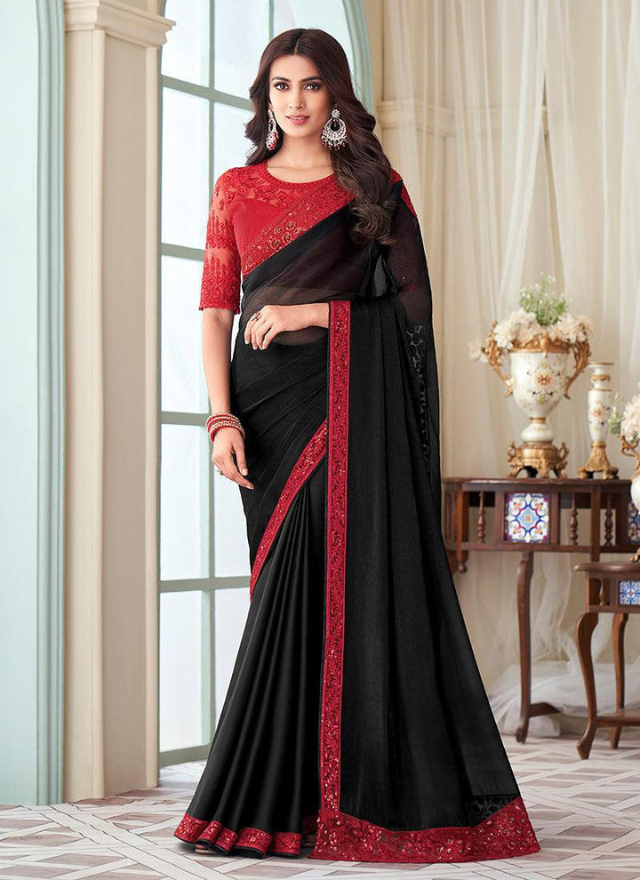 Beautiful red and black silk fabric saree with intricate embroidery by Kreeva