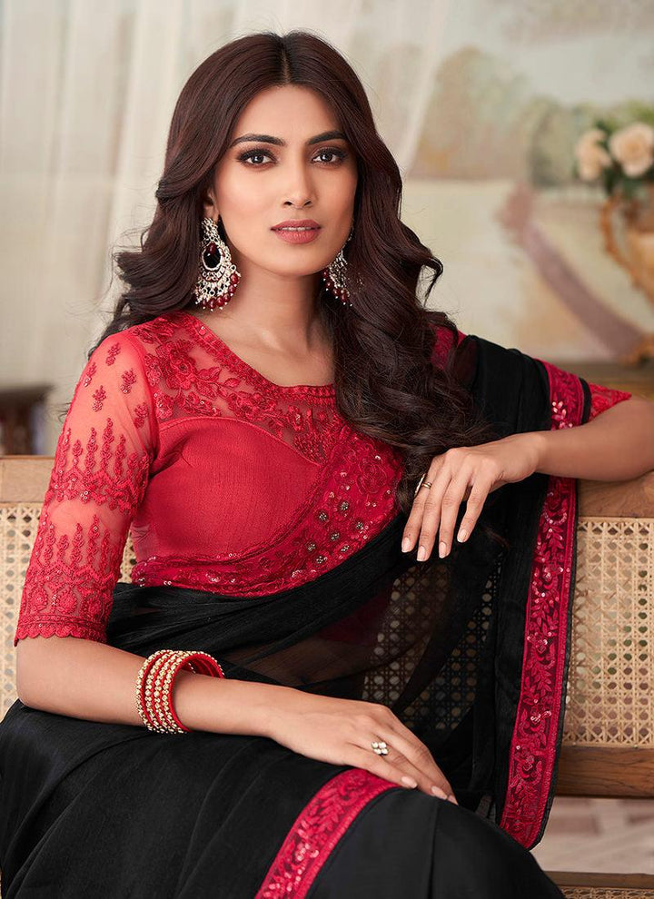 Beautiful red and black silk fabric saree with intricate embroidery from Kreeva