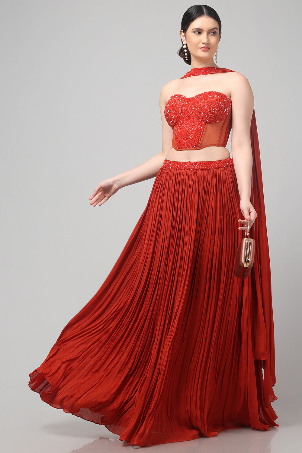 Rust Orange Corset with pleated Skirt & Dupatta