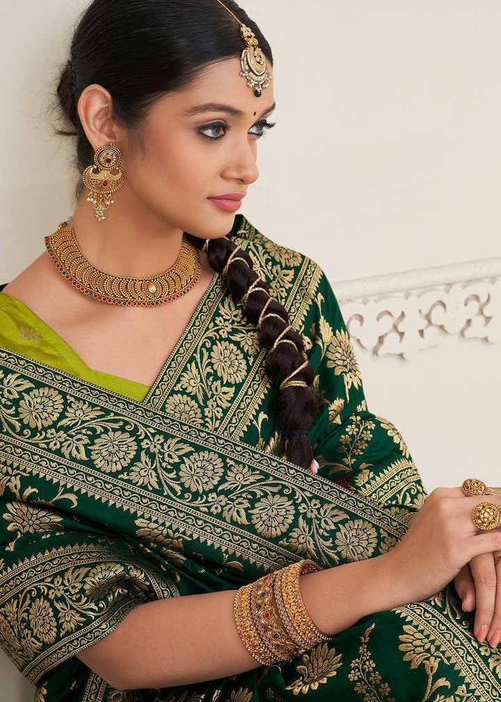 Sacramento Green Zari Woven Dola Silk Saree | Stitched Blouse - qivii