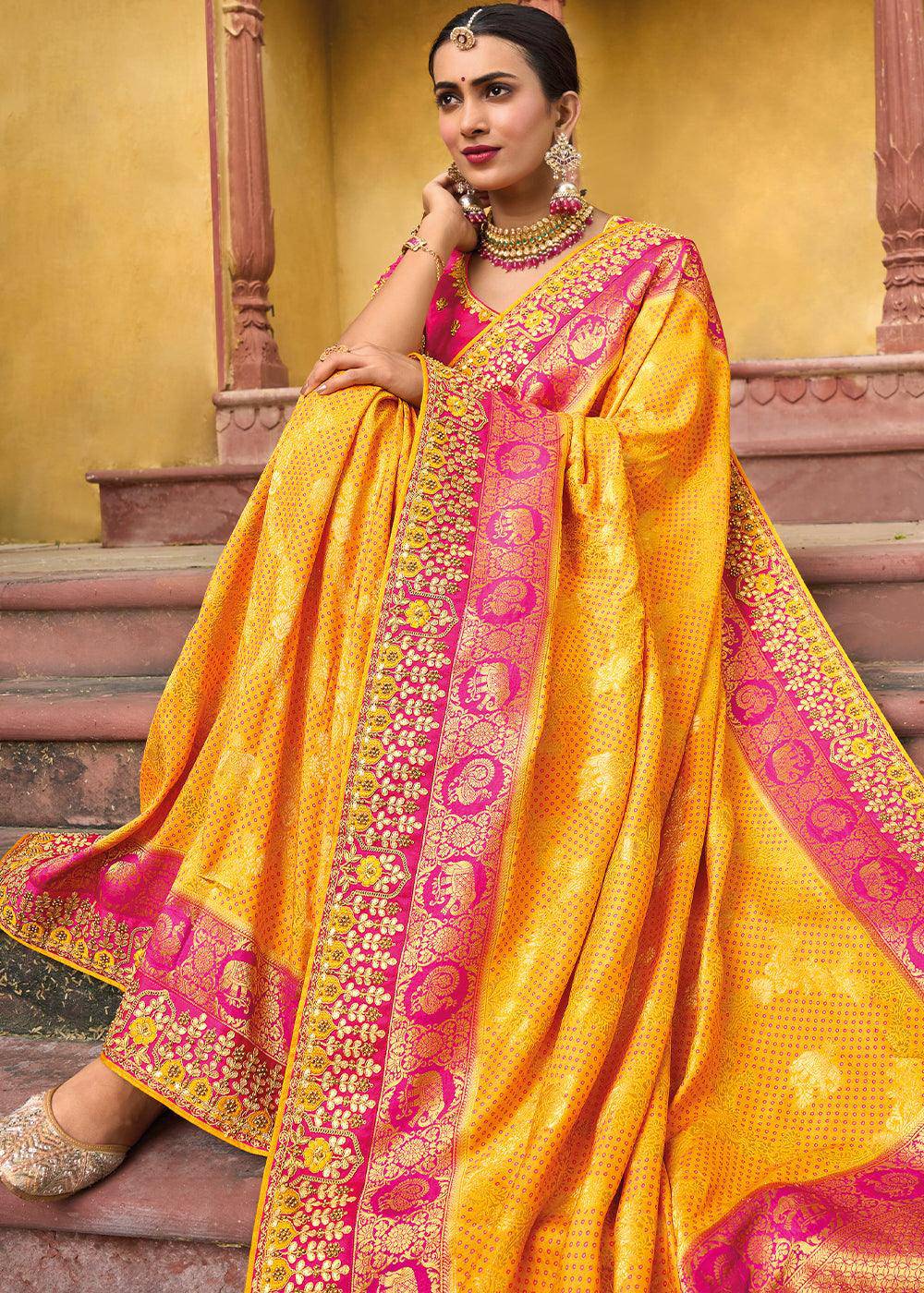 Saffron Yellow Dola Silk Saree with Beautiful Embroidery work: Wedding Edition | Stitched Blouse - qivii