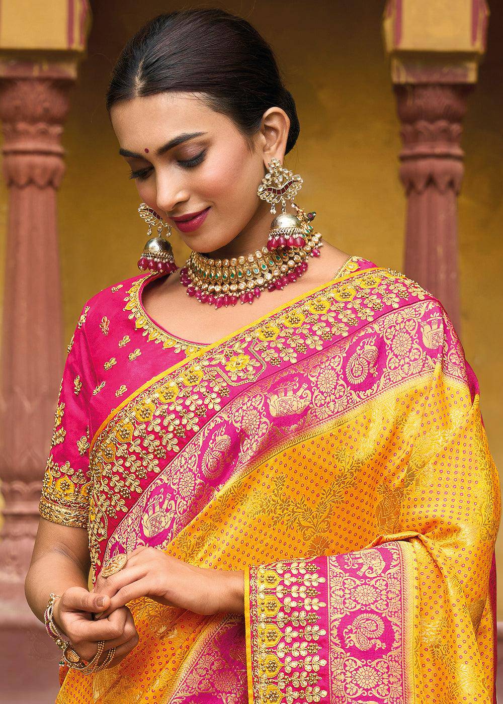 Saffron Yellow Dola Silk Saree with Beautiful Embroidery work: Wedding Edition | Stitched Blouse - qivii