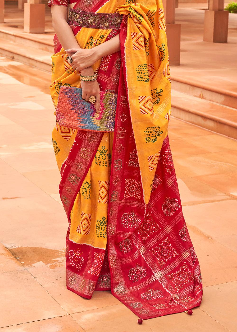 Saffron Yellow Printed Patola Silk Saree with Swaroski Work | Stitched Blouse - qivii