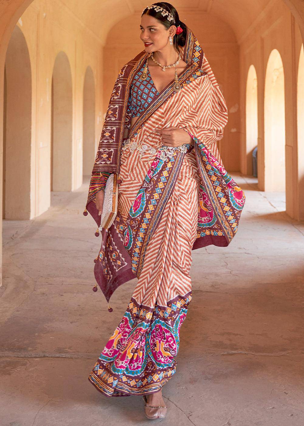 Shades Of Brown Printed Patola Silk Saree with Zari Border & Tassels on Pallu | Stitched Blouse - qivii