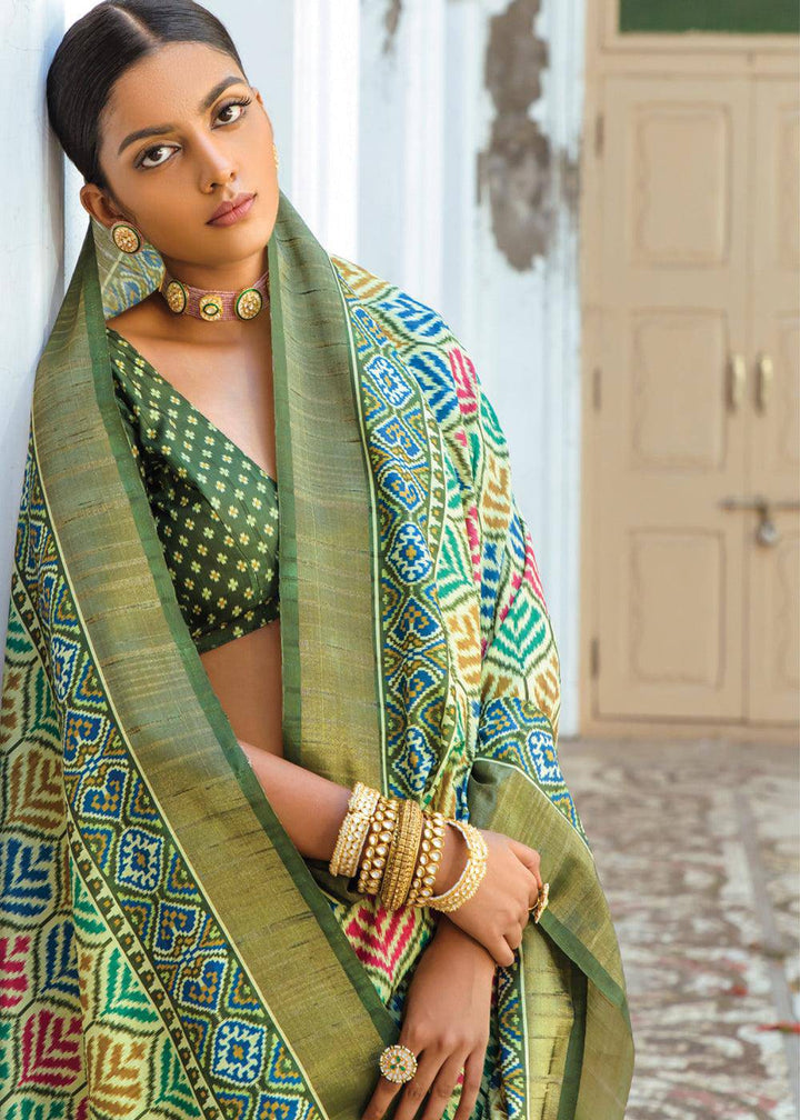 Shades Of Green Patola Printed Dola Silk Saree | Stitched Blouse - qivii