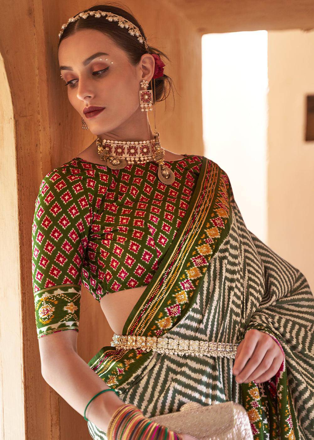 Shades Of Green Printed Patola Silk Saree with Zari Border & Tassels on Pallu | Stitched Blouse - qivii