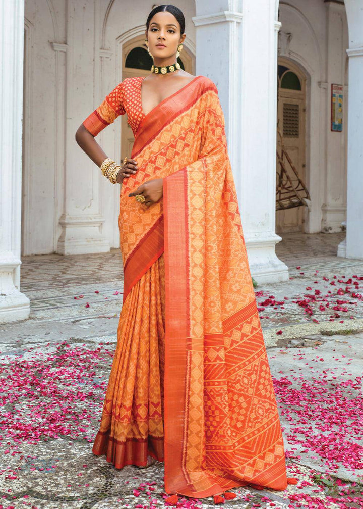 Shades Of Orange Patola Printed Dola Silk Saree | Stitched Blouse - qivii