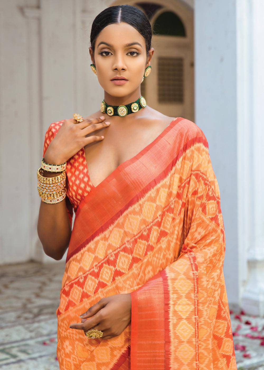 Shades Of Orange Patola Printed Dola Silk Saree | Stitched Blouse - qivii