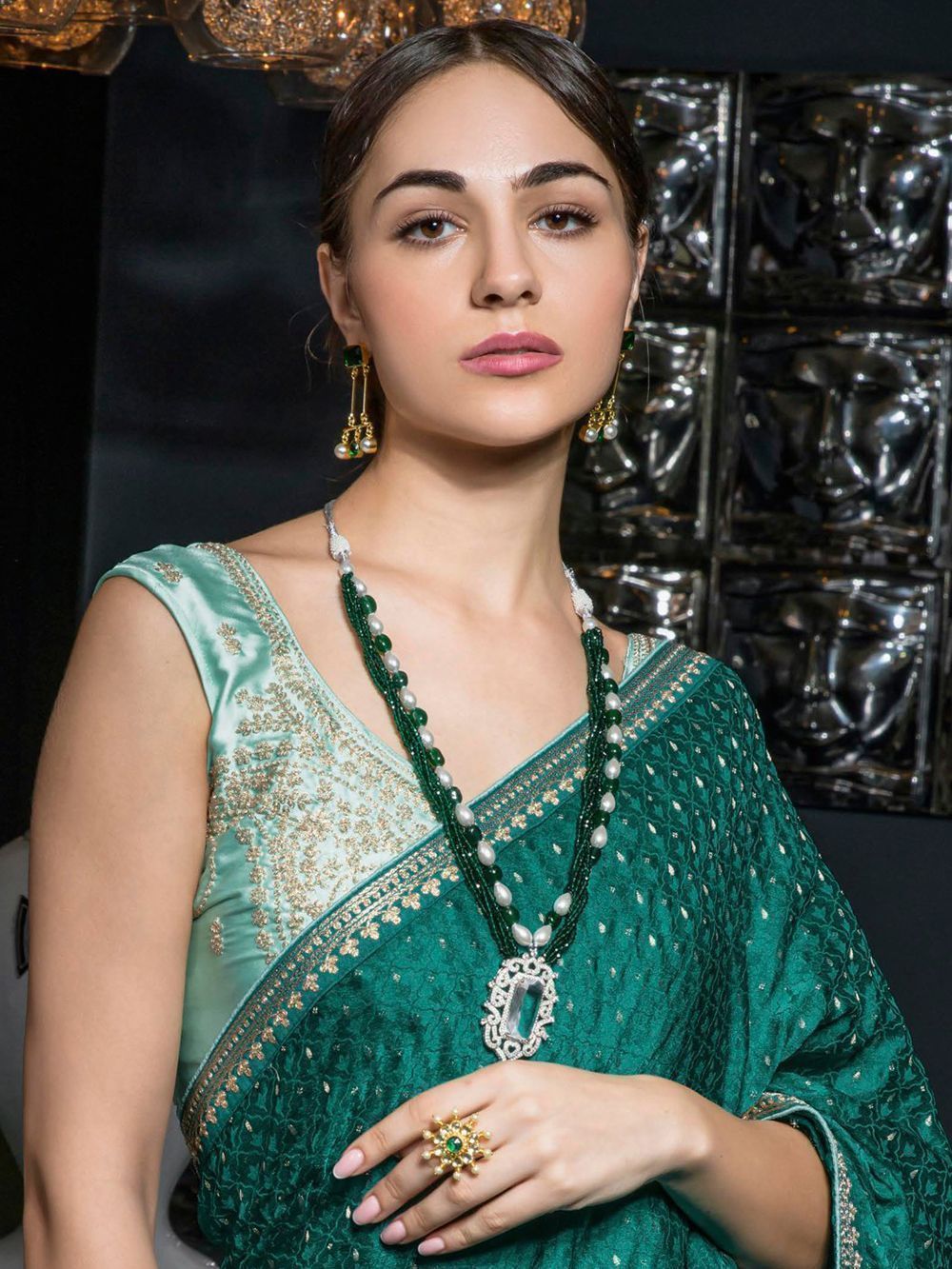 Glamorous Teal-Green Zari Weaving Satin Function Wear Saree